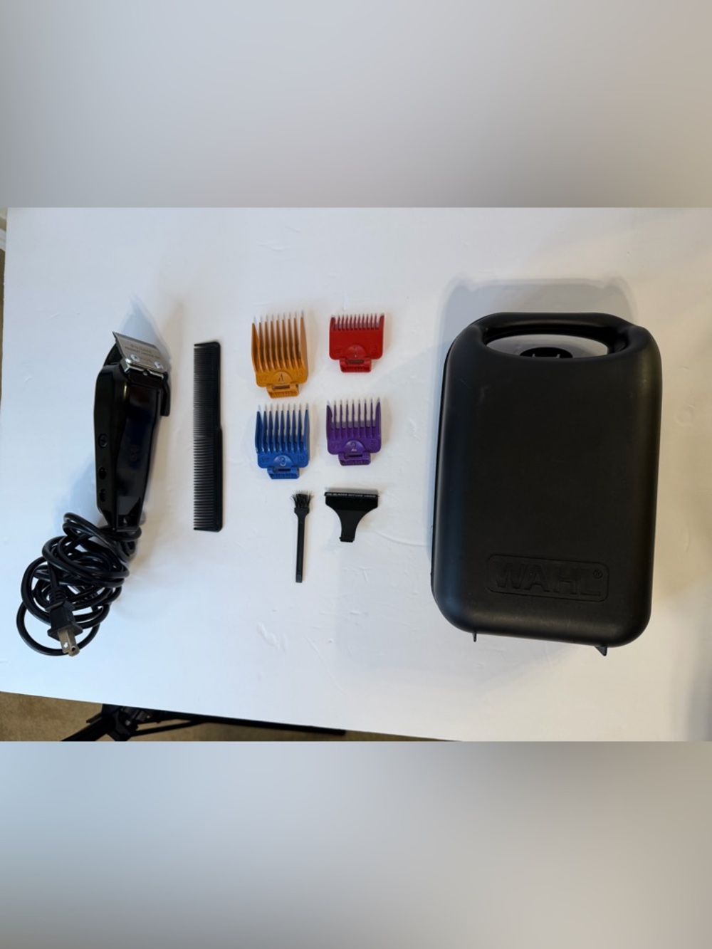 Wahl Black Corded Hair Clipper with Red, Orange, Blue and Purple Guide Combs